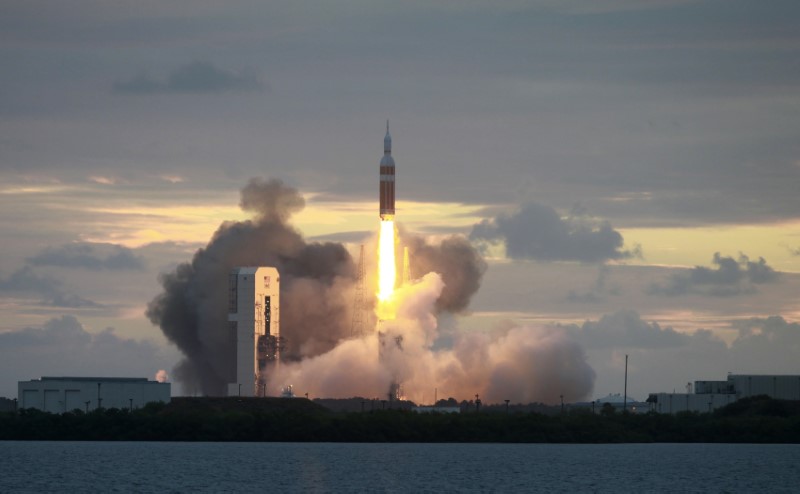 © Reuters. The Delta IV Heavy rocket with the Orion spacecraft lifts off from the Cape Canaveral Air Force Station in Cape Canaveral