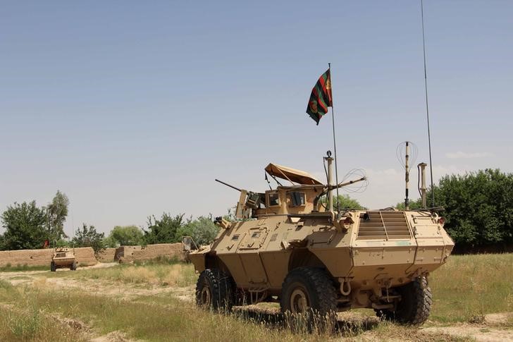 © Reuters. A military vehicle patrols in the Babaji area of Lashkar Gah Helmand province, Afghanistan