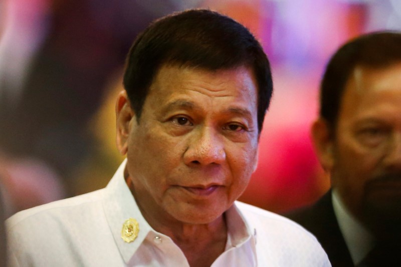 © Reuters. Philippines President Rodrigo Duterte leaves the opening ceremony of the ASEAN Summit in Vientiane