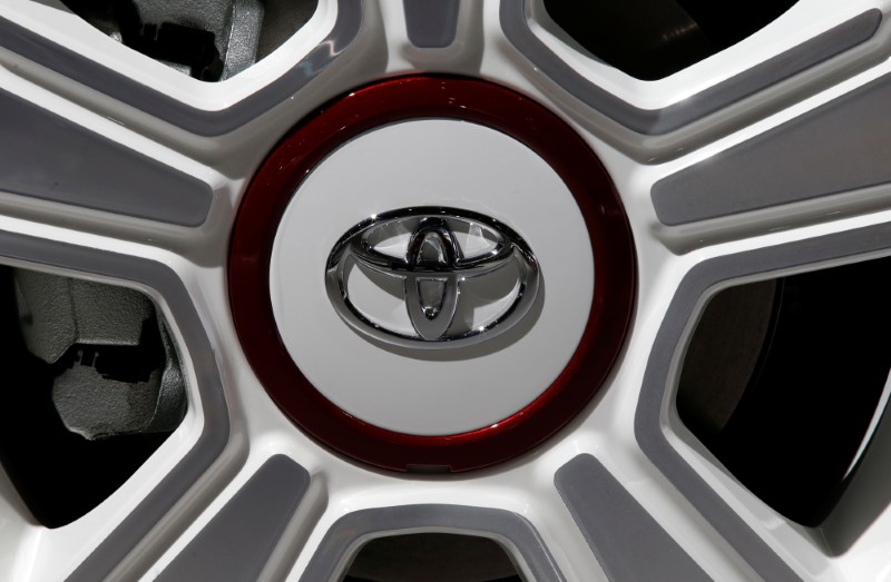© Reuters. View of a Toyota logo on a wheel at the Mondial de l'Automobile, Paris auto show, during media day in Paris