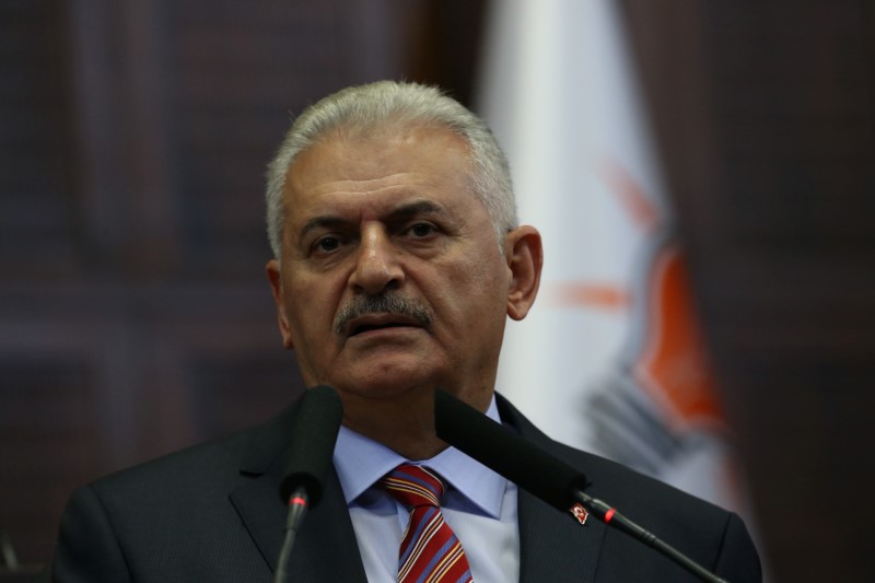 © Reuters. Turkey's Prime Minister Binali Yildirim addresses members of parliament from his ruling AK Party during a meeting at the Turkish parliament in Ankara