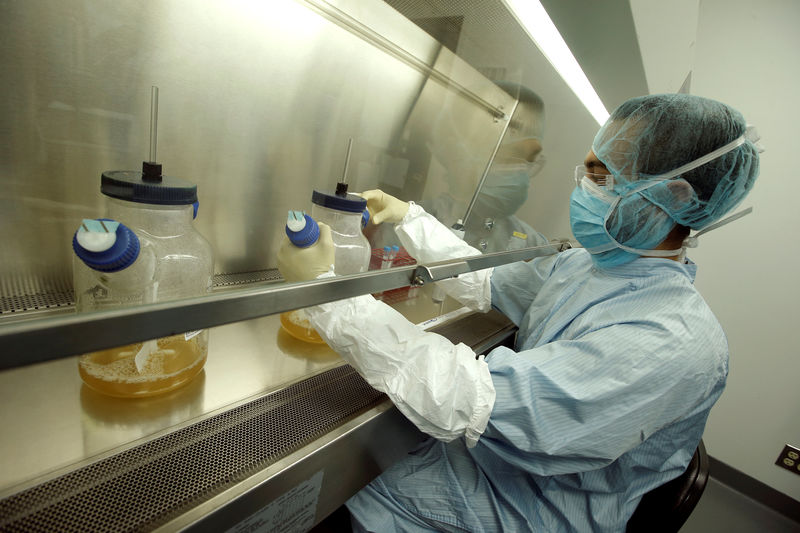 © Reuters. Manufacturing Associates David Artus work in the cell culture room during work on developing a vaccine for the Zika virus at Protein Sciences Inc. in Meriden