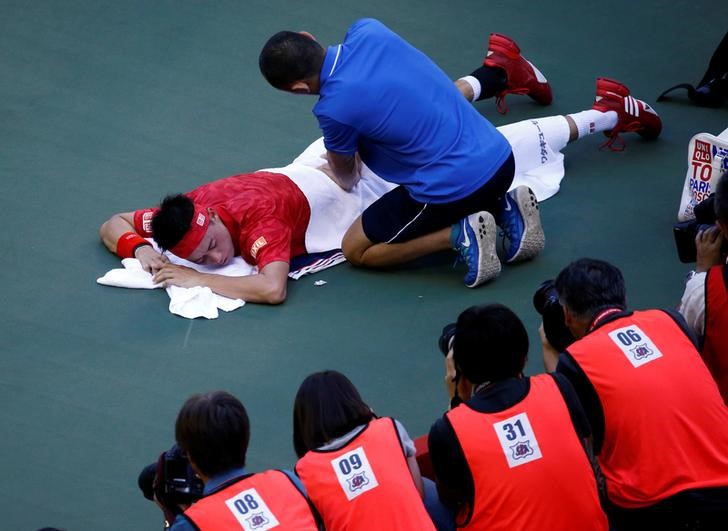 © Reuters. نيشيكوري ينسحب من بطولة اليابان للتنس بسبب الإصابة