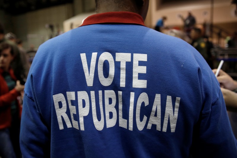 © Reuters. A supporter of Republican presidential nominee Donald Trump attends a campaign rally in Reno