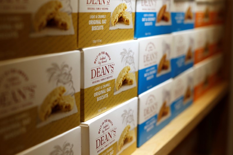 © Reuters. Rows of biscuits are seen on the shelves of the gift shop at Dean's of Huntly bakery in Scotland