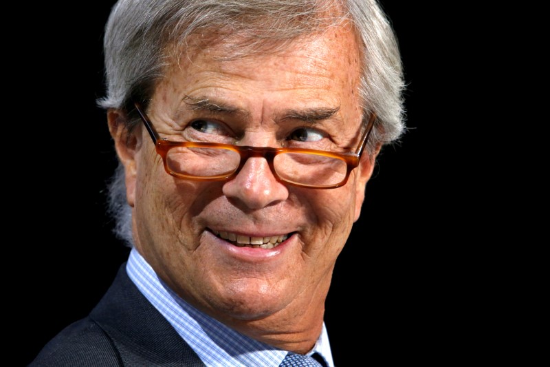 © Reuters. File pohto of Vincent Bollore, Chairman of media group Vivendi, reacts during the company's shareholders meeting in Paris