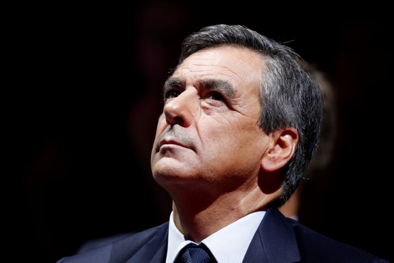 © Reuters. FILLON CRITIQUE LE REFERENDUM DEMANDÉ PAR SARKOZY