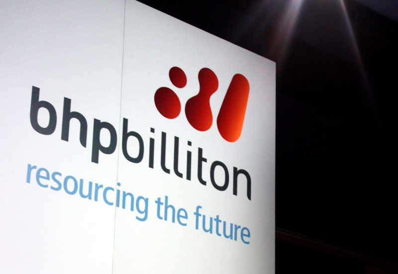 © Reuters. A promotional sign adorns a stage at a BHP Billiton function in central Sydney