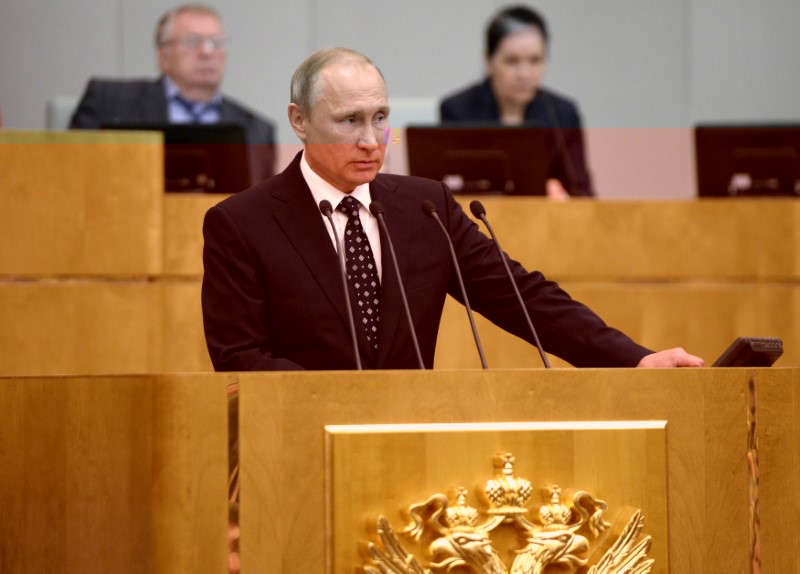 © Reuters. Russian President Putin attends session of lower house of parliament in Moscow