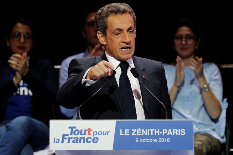 © Reuters. DANS SON DUEL AVEC JUPPÉ, SARKOZY CHERCHE À REPRENDRE LA MAIN