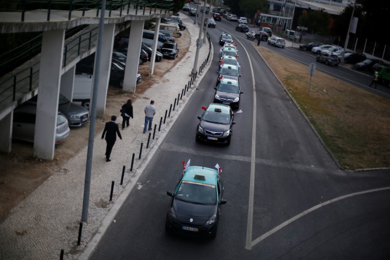 Portugal cab drivers block Lisbon airport in anti-Uber protest By 