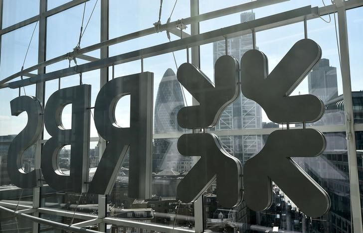 © Reuters. File photo of city of London business district seen through windows of the Royal Bank of Scotland headquarters in London