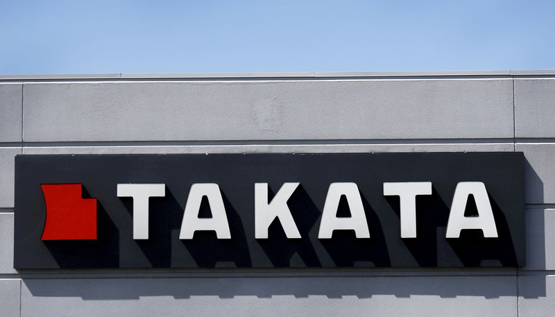 © Reuters. A sign with the TAKATA logo is seen outside the Takata Corporation building in Auburn Hills, Michigan