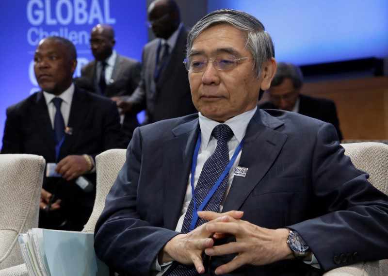 © Reuters. Governor of the Bank of Japan Haruhiko Kuroda attends IMFC plenary