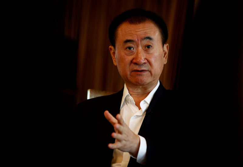 © Reuters. Wang Jianlin, chairman of the Wanda Group, speaks during an interview in Beijing