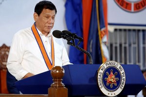 © Reuters. Philippines President Rodrigo Duterte speaks during the ceremony marking the anniversary of the Philippines Coast Guard in Manila