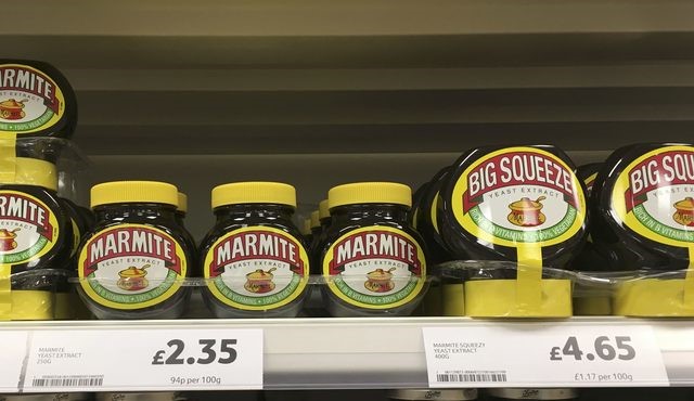 © Reuters. Jars of Marmite are displayed for sale on a shelf at a Tesco supermarket near Manchester