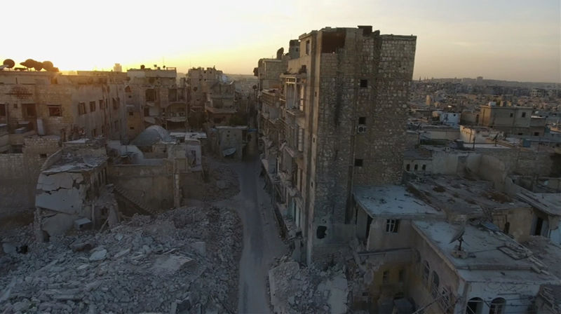 © Reuters. A still image from video taken October 12, 2016 of a general view of the bomb damaged Old City area of Aleppo, Syria.