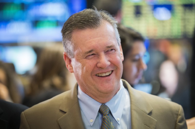 © Reuters. Chief executive officer of Hershey,  Bilbrey, smiles as he stands on the floor of the New York Stock Exchange in New York