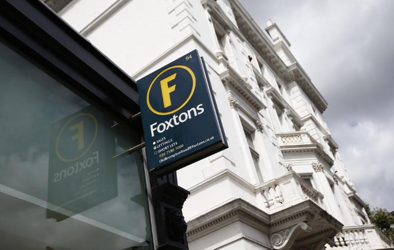 © Reuters. A Foxtons estate agent sign is seen outside a branch in west London