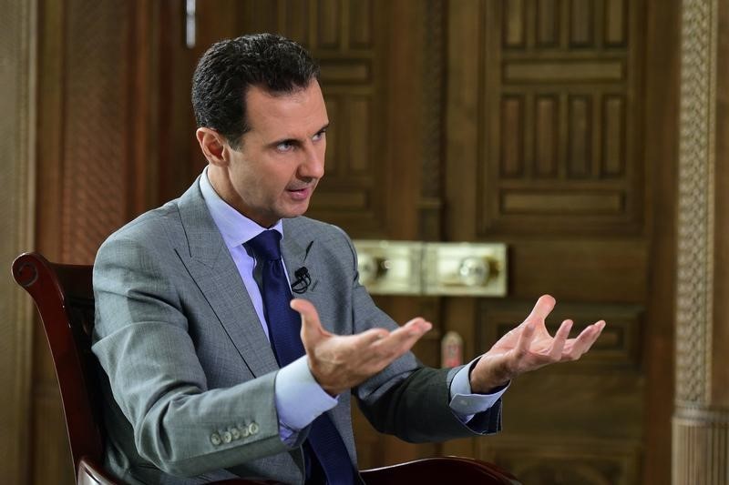© Reuters. Syria's President Bashar al-Assad speaks during an interview with Russian tabloid Komsomolskaya Pravda