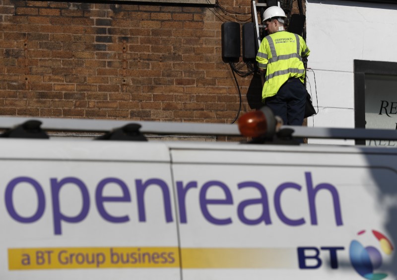 © Reuters. A BT openreach engineer works on a telephone line in Manchester northern England.