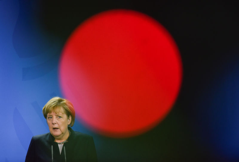 © Reuters. German Chancellor Merkel addresses the media after a meeting with Chad President Deby at the Chancellery in Berlin