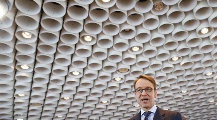 © Reuters. Weidmann, chief of Germany's Bundesbank, arrives for the yearly news conference in Frankfurt