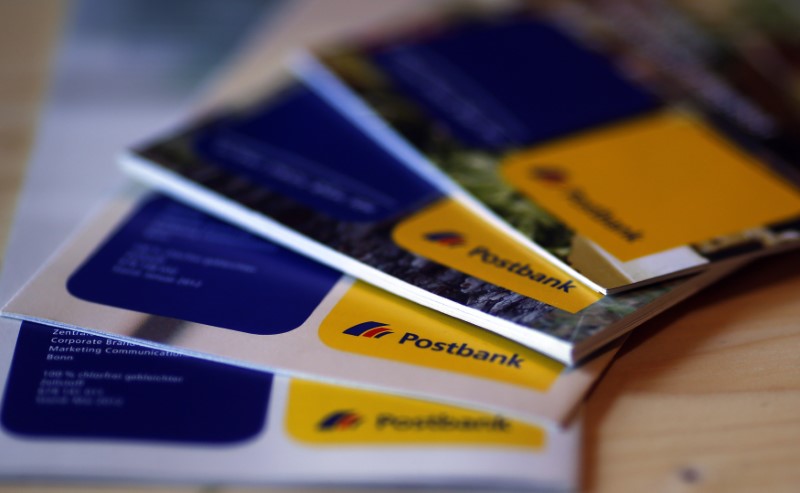 © Reuters. An illustration picture shows brochures of the Postbank AG  on a table in Munich
