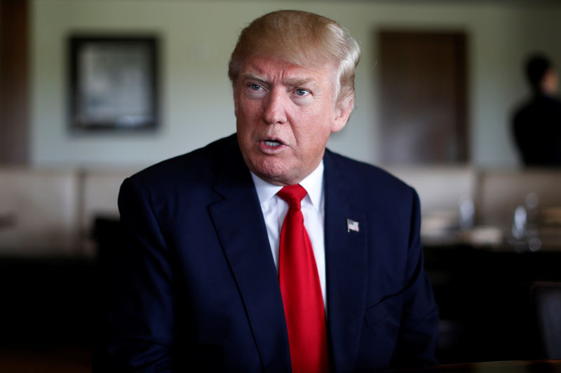 © Reuters. Trump sits for an interview at Trump National Doral golf club in Miami