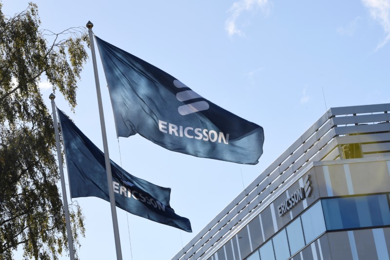 © Reuters. Flags with Ericsson logo are pictured outside company's head office in Stockholm