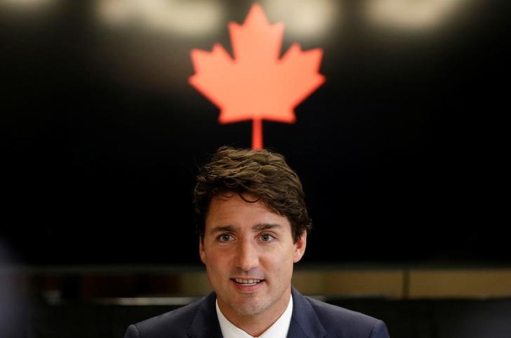 © Reuters. Canada's Prime Minister Justin Trudeau speaks during a meeting with members of the China Entrepreneur Club with  at Willson House in Chelsea