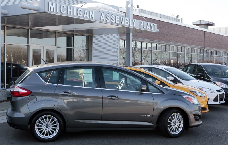 © Reuters. A Ford 2013 Ford C-MAX Hybrid vehicle is seen on display outside the Michigan Assembly Plant in Wayne