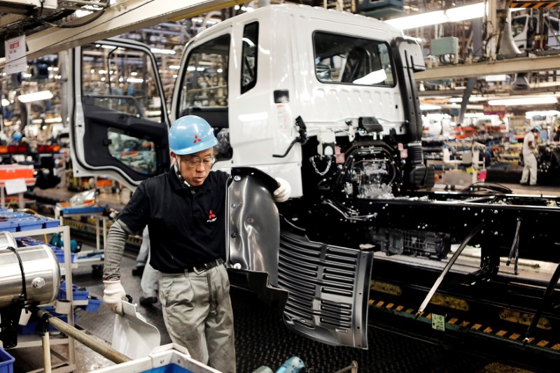 © Reuters. A man works at assembly line of the MFTBC factory in Kawazaki