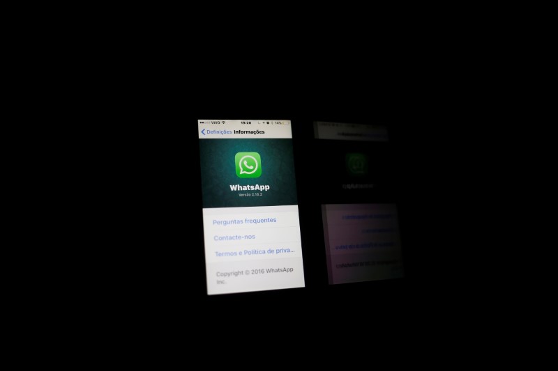 © Reuters. An illustration photo shows the Whatsapp application logo on a mobile phone in Rio de Janeiro, Brazil