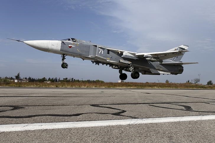 © Reuters. File photo from Russia's Defence Ministry shows a Sukhoi Su-24 fighter jet taking off from the Hmeymim air base near Latakia