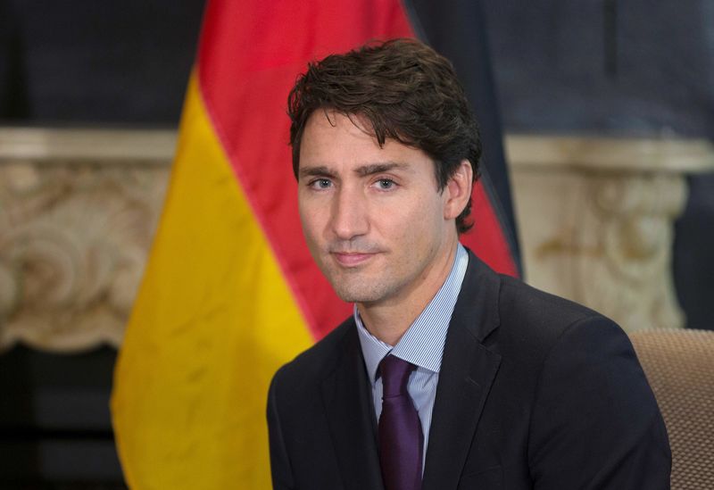 © Reuters. الاتحاد الأوروبي وكندا يوقعان على اتفاقية للتجارة الحرة بعد غموض استمر أسابيع