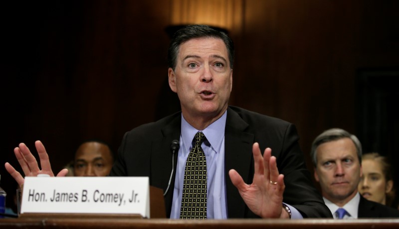 © Reuters. FBI Director Comey testifies on Capitol Hill in Washington