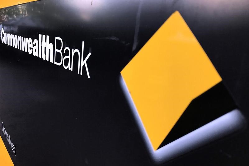 © Reuters. A Commonwealth Bank of Australia logo adorns the wall of a branch in Sydney, Australia