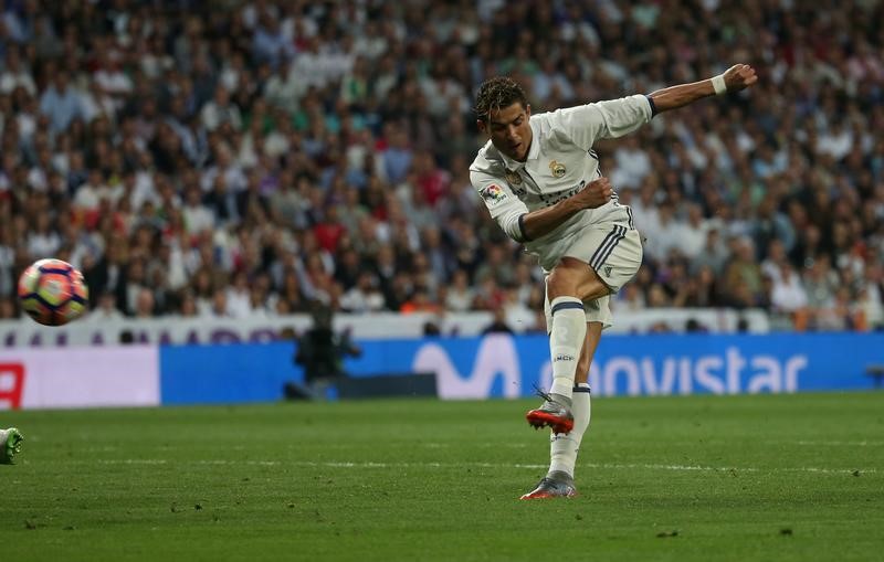 © Reuters. رونالدو قد يضع ريال مدريد على بُعد خطوة من اللقب أمام سيلتا فيجو