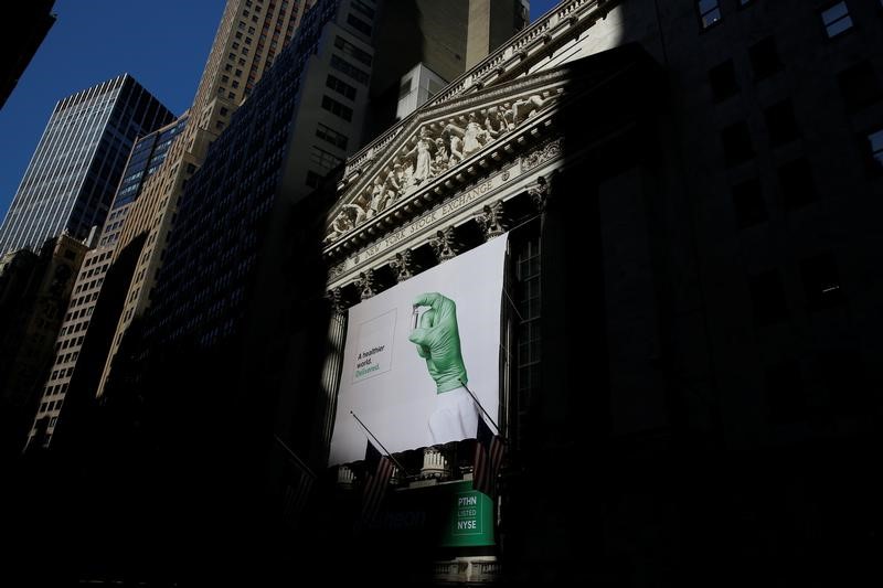 © Reuters. A banner for Patheon NV hangs to celebrate the company's IPO at the NYSE