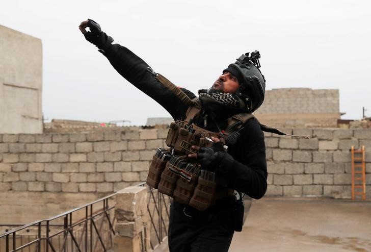 © Reuters. متحدث عراقي: 12 كيلومترا مربعا فقط من الموصل تحت سيطرة الدولة الإسلامية