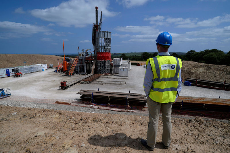 © Reuters. FILE PHOTO: An employee poses for a photograph at the Sirius Minerals test drilling station on the North Yorkshire Moors near Whitby