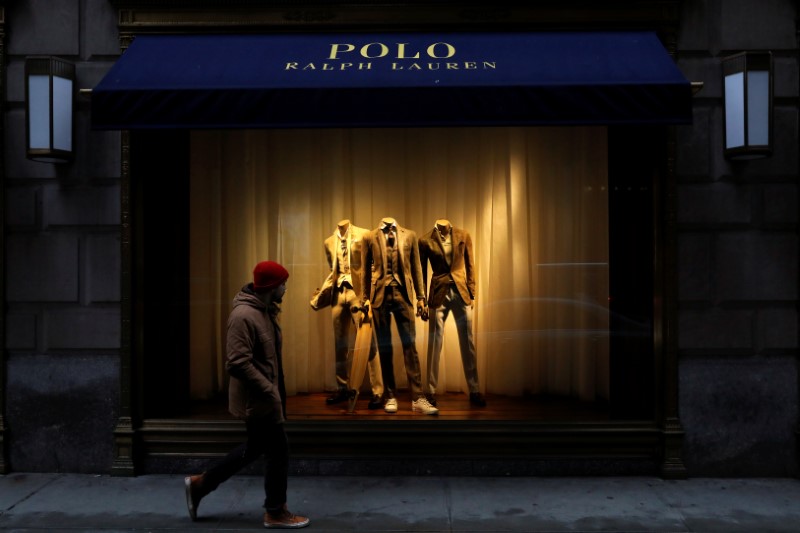 © Reuters. A man walks past Ralph Lauren Corp.'s  flagship Polo store on Fifth Avenue in New York