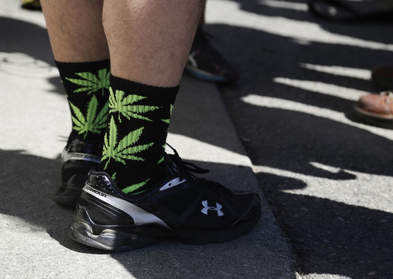 © Reuters. Socks with marijuana leaves are pictured at Cannabis City during the first day of legal retail marijuana sales in Seattle, Washington