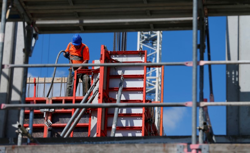 © Reuters. A construction worker prepares concrete formworks in Berlin
