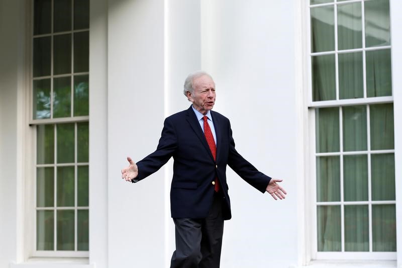 © Reuters. Former Senator Joe Lieberman leaves