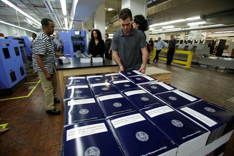 © Reuters. Workers prepare for delivery printed President Donald Trump's FY2018 budget at the Government Publishing Office in Washington