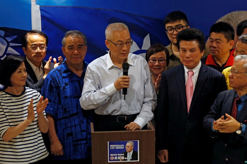 © Reuters. Wu Den-yih, newly elected chairman of Taiwan's opposition Nationalist Kuomintang Party (KMT), speaks during a news conference in Taipei