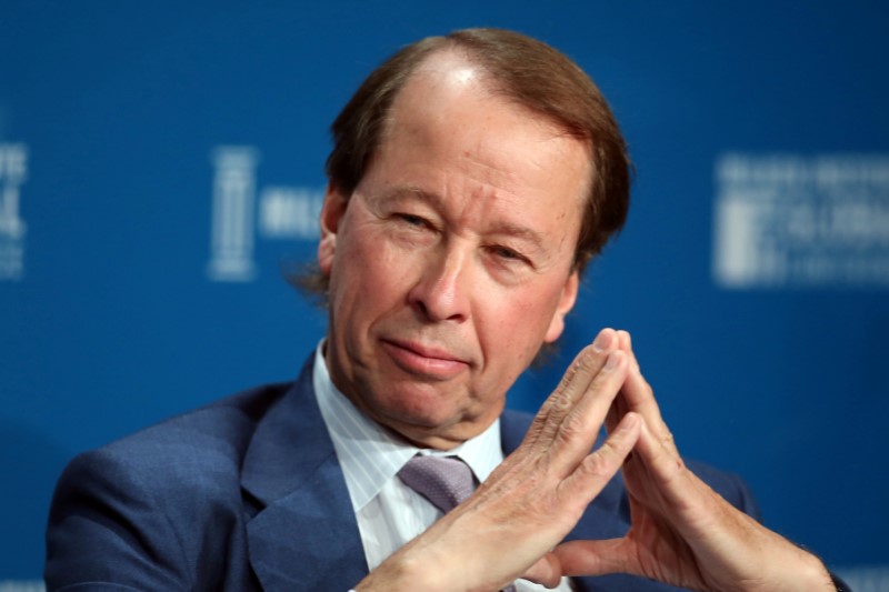 © Reuters. FILE PHOTO: Hamilton "Tony" James, President of Blackstone, speaks during the Milken Institute Global Conference in Beverly Hills